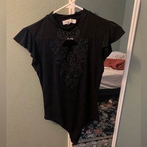 Lacy front black body suit